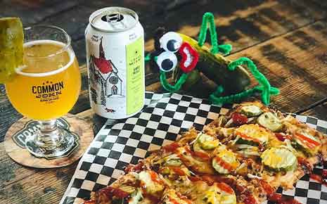 common john brewery beer, pizza and pickle character